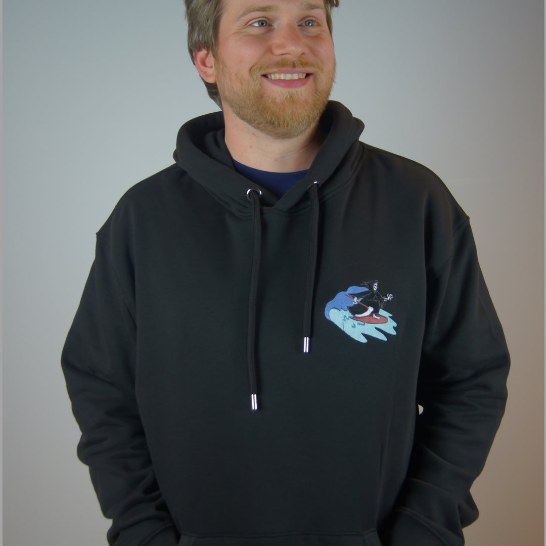 Jack wearing surfing reaper hoodie in black 