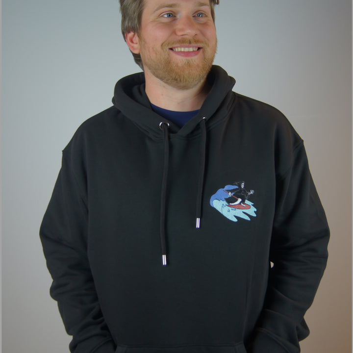 Jack wearing surfing reaper hoodie in black 