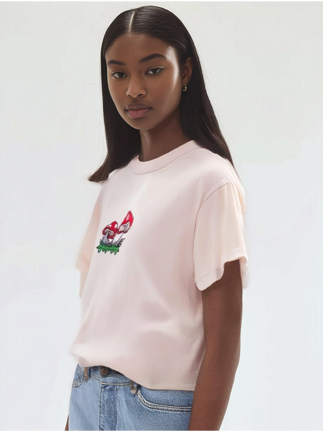 Eco Tee with tiny toadstools embroidery on the front centre