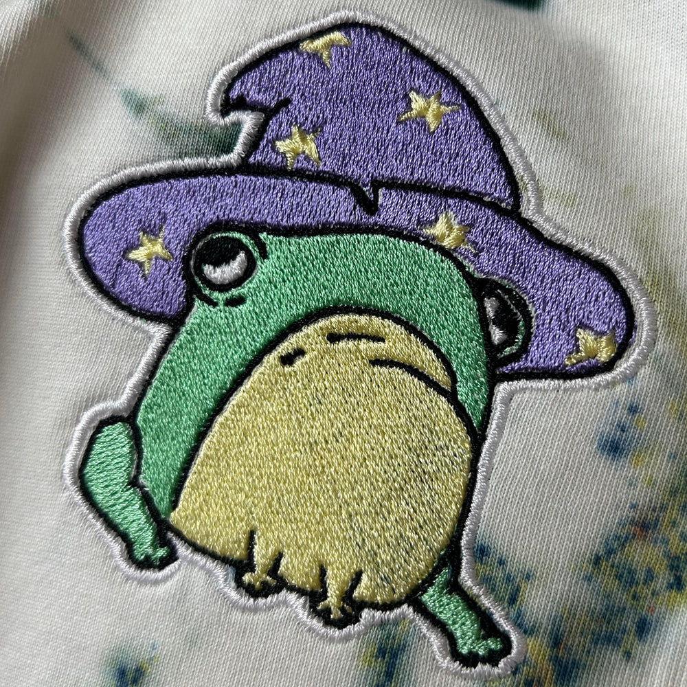 Close -Up of wizard frog Embroidery on tie-dye T-Shirt