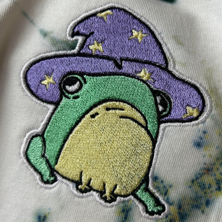 Close -Up of wizard frog Embroidery on tie-dye T-Shirt